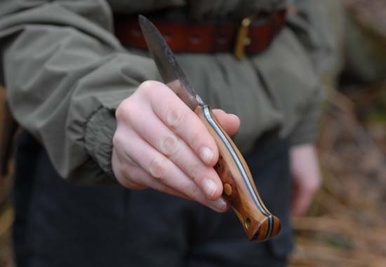 How to pass a bushcraft knife to another person