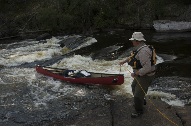 Ray Goodwin lining a canoe