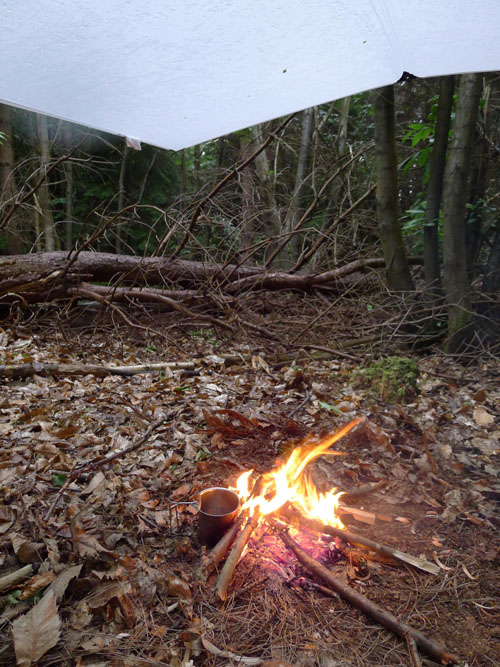 Fire under a tarp