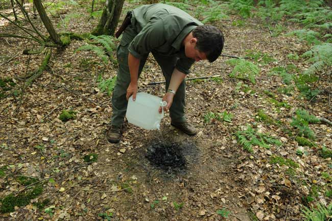 Adding plenty of water to douse the embers