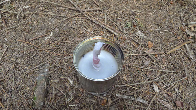 Improvised tin can candle 