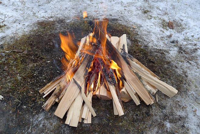 Small fire burning in winter.