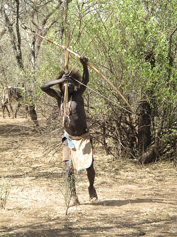 Hadzabe man hunting with bow