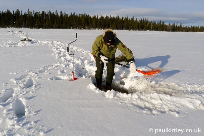 Paul Kirtley moving slush in the arctic