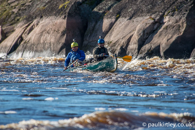 Canoeists with water
