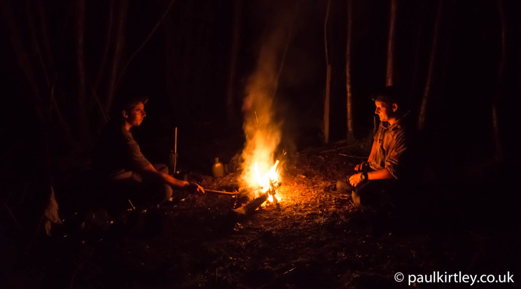 A nighttime campfire scene