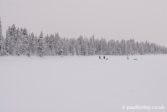 Men walking in snowy wilderness