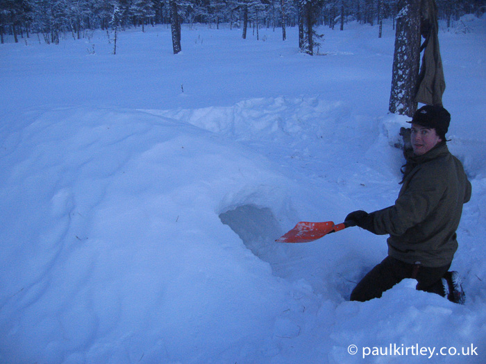 Paul Kirtley digging one man quinzhee snow shelter