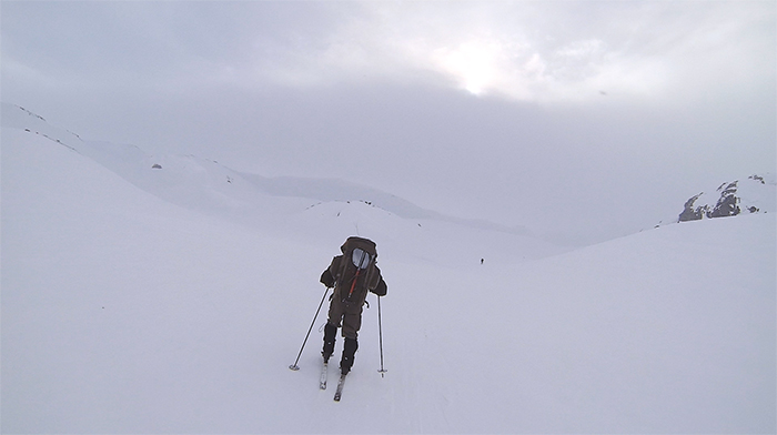 Man skiing in very snowy surroundings in Norwegian hills