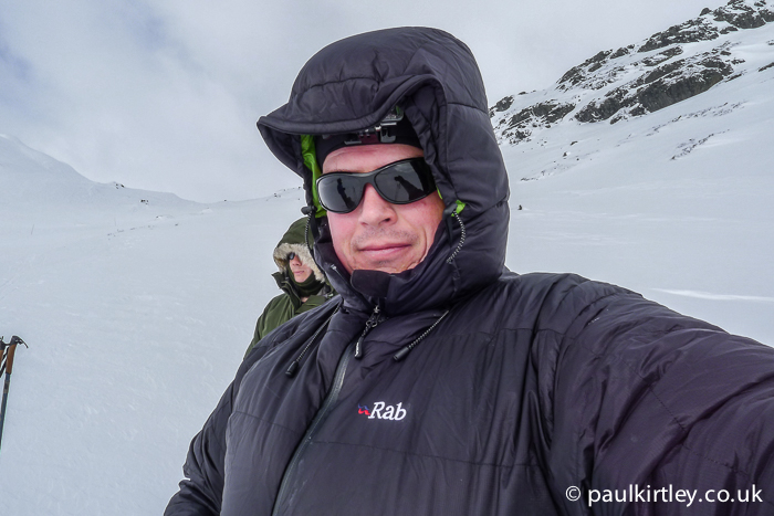 Paul Kirtley wearing Rab Neutrino Endurance down jacket in the Norwegian mountains