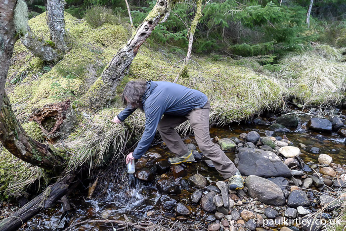 Chris Townsend collecting water from a stream