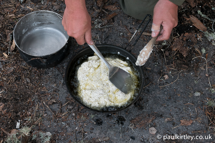 Once the dough has been flattened as much as needed, then bring some of the hot oil up on top of the dough.  This helps to start cooking the bread, prepares it for being flipped and adds flavour. Photo: Amanda Quaine
