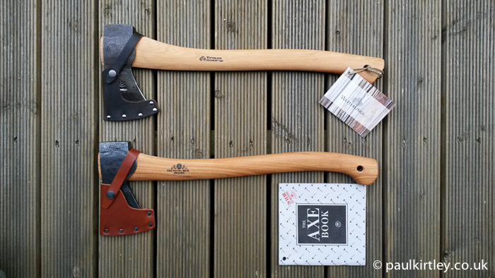 Wetterlings Outdoor Axe and Gransfors Bruk Small Forest Axe together on wooden planks
