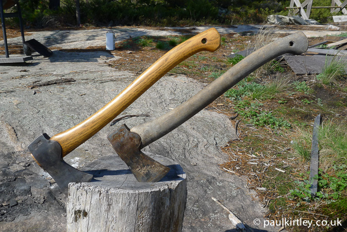 Two Gransfors Small Forest Axes, one in good shape, the other neglected.  