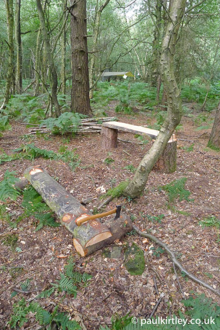 A break while building new benches for a semi-permanent camp in Sussex, England, the axe is embedded in one of the low bench supports. Photo: Paul Kirtley
