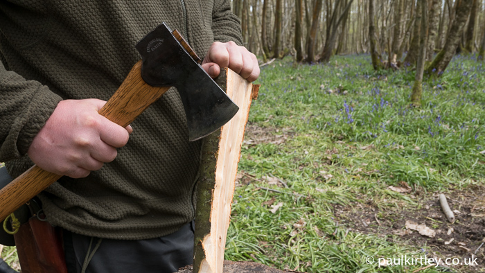 The other important rule is not to raise the cutting edge of your axe higher than the hand which holds the work.  This way, you can never accidentally cut down onto your hand.