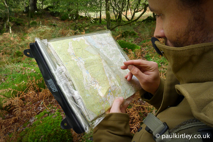 Pointing out map features with a blade of grass