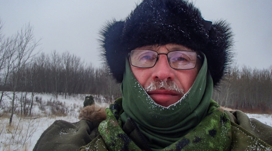 Man wearing frosty winter clothing in Canadian snow conditions.