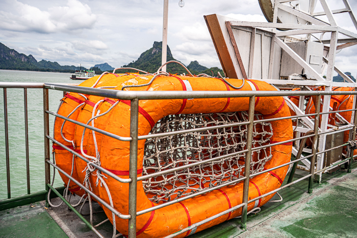 Simple orange liferafts with rope interior