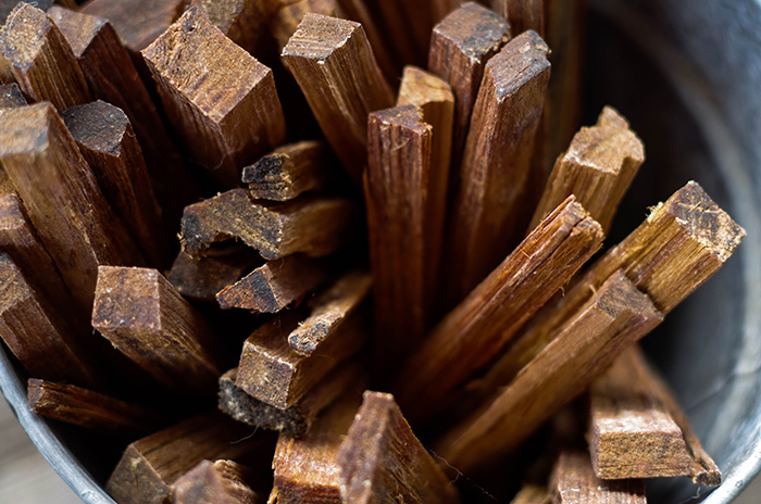 Sticks of fatwood in a galvanised bucket