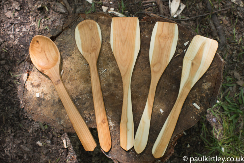 richly coloured wooden utensils made from cherry by Paul Kirtley