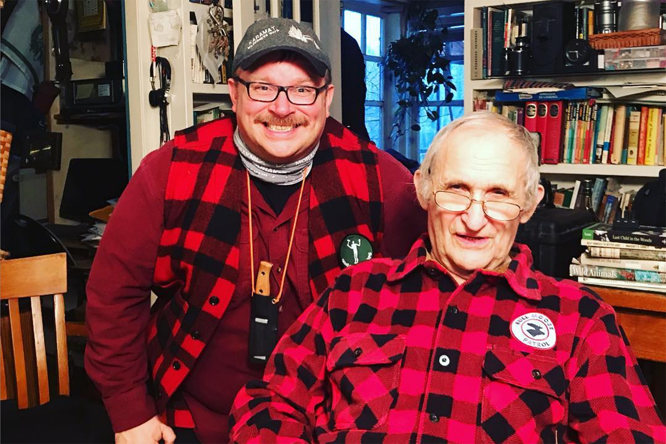 Two Canadian outdoorsmen in red check shirts