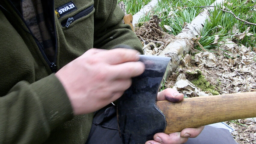 Paul Kirtley sharpening an axe