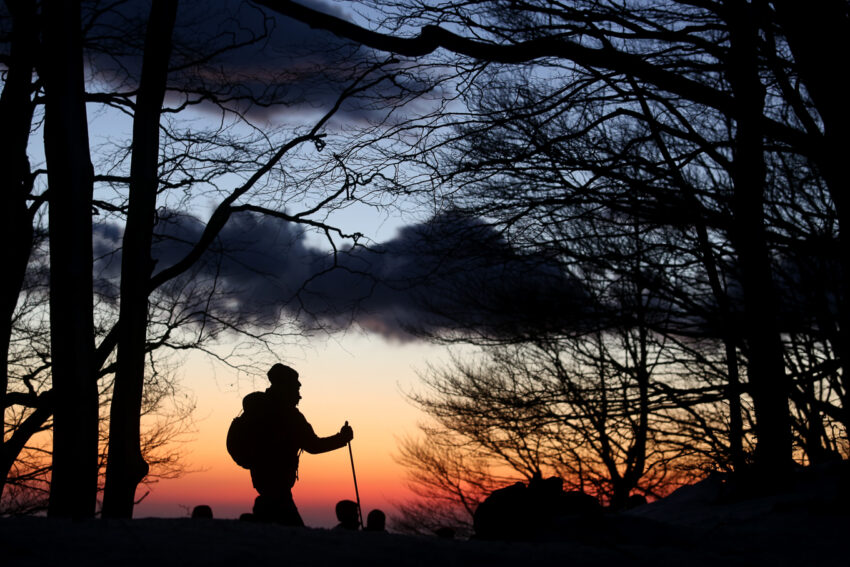 people out at sunset in the short days of the year