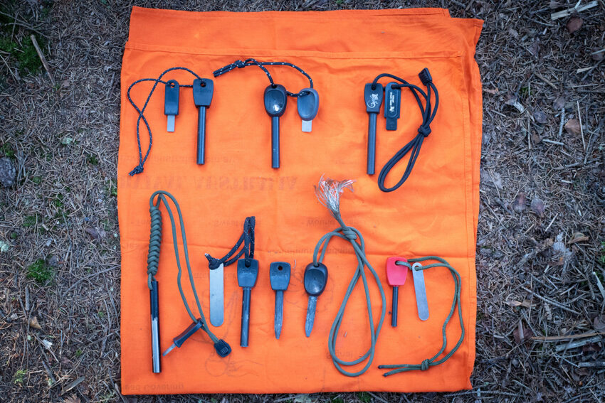 Small metal rods with plastic handles laid out on an orange cloth